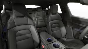 Interior view showing the front seats of Taycan 4
