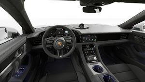Interior view showing the steering wheel and dashboard of Taycan GTS