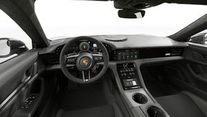 Vue de l'intérieur montrant le volant et le tableau de bord d'un véhicule de transport de marchandises. Taycan Turbo GT with Weissach Package