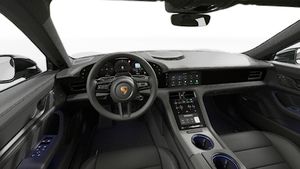 Vue de l'intérieur montrant le volant et le tableau de bord d'un véhicule de transport de marchandises. Taycan 4S Black Edition