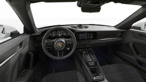 Interior view showing the steering wheel and dashboard of 911 Carrera GTS Cabriolet