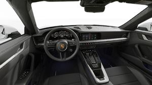 Interior view showing the steering wheel and dashboard of 911 Carrera 4S Cabriolet