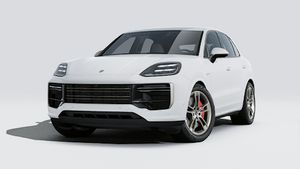 Exterior view of Cayenne Turbo E-Hybrid showing the front and left side of the car