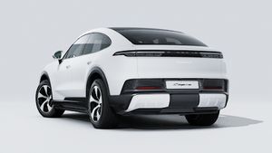 Exterior view of Cayenne S Coupé Electric showing the back and left side of the car