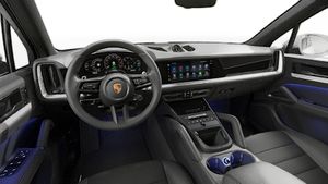 Interior view showing the steering wheel and dashboard of Cayenne E-Hybrid