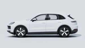 Exterior view of Cayenne E-Hybrid showing the left side of the car