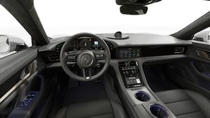 Vista interior que muestra el volante y el salpicadero de Taycan Turbo Cross Turismo