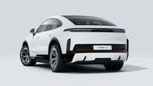 Exterior view of Cayenne Turbo Coupé Electric showing the back and left side of the car