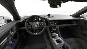 Interior view showing the steering wheel and dashboard of Taycan GTS