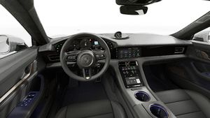 Interior view showing the steering wheel and dashboard of Taycan Turbo Cross Turismo