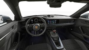 Interior view showing the steering wheel and dashboard of 911 Carrera T