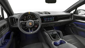 Interior view showing the steering wheel and dashboard of Cayenne Turbo GT