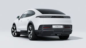 Exterior view of Cayenne Coupé Electric showing the back and left side of the car