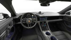 Interior view showing the steering wheel and dashboard of Taycan Black Edition
