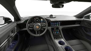 Interior view showing the steering wheel and dashboard of Taycan 4S Black Edition
