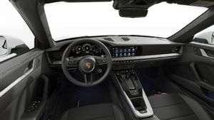 Interior view showing the steering wheel and dashboard of 911 Carrera Cabriolet