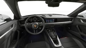 Interior view showing the steering wheel and dashboard of 911 Targa 4S