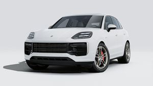 Exterior view of Cayenne Turbo E-Hybrid showing the front and left side of the car