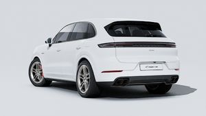 Exterior view of Cayenne Turbo E-Hybrid showing the back and left side of the car