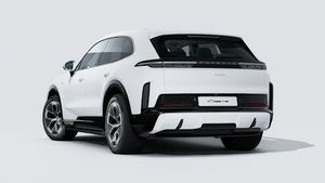 Exterior view of Cayenne Turbo Electric showing the back and left side of the car
