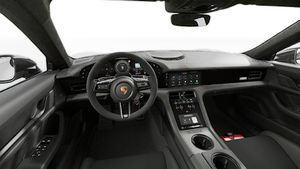 Interior view showing the steering wheel and dashboard of Taycan Turbo GT with Weissach Package
