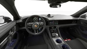 Interior view showing the steering wheel and dashboard of Taycan Turbo GT