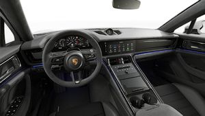 Interior view showing the steering wheel and dashboard of Panamera GTS
