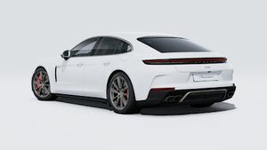 Exterior view of Panamera Turbo E-Hybrid showing the back and left side of the car