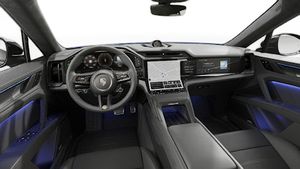 Vista interior que muestra el volante y el salpicadero de Cayenne Turbo Electric