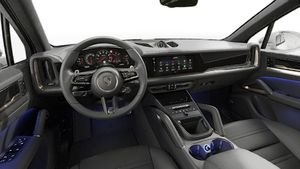Vista interior que muestra el volante y el salpicadero de Cayenne Turbo E-Hybrid