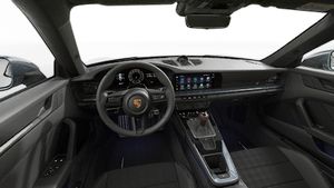 Interior view showing the steering wheel and dashboard of 911 Carrera T