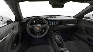 Interior view showing the steering wheel and dashboard of 911 Carrera GTS Cabriolet