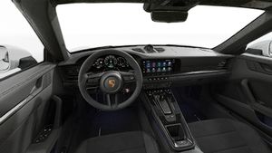 Interior view showing the steering wheel and dashboard of 911 Targa 4 GTS