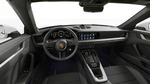 Interior view showing the steering wheel and dashboard of 911 Targa 4S