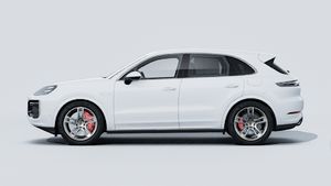 Exterior view of Cayenne Turbo E-Hybrid showing the left side of the car