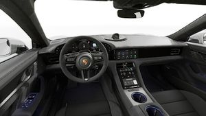 Interior view showing the steering wheel and dashboard of Taycan GTS