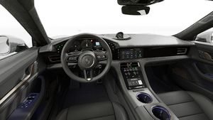 Interior view showing the steering wheel and dashboard of Taycan Turbo Cross Turismo