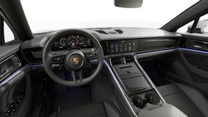 Interior view showing the steering wheel and dashboard of Panamera