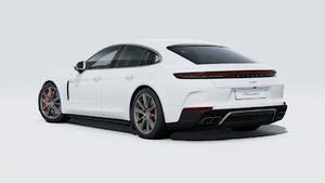 Exterior view of Panamera Turbo E-Hybrid showing the back and left side of the car