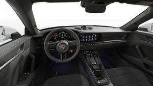 Interior view showing the steering wheel and dashboard of 911 Carrera GTS
