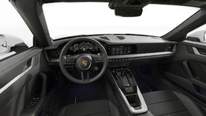 Interior view showing the steering wheel and dashboard of 911 Targa 4S