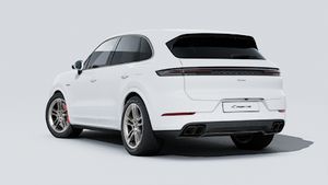 Exterior view of Cayenne Turbo E-Hybrid showing the back and left side of the car