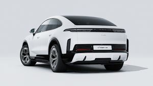 Exterior view of Cayenne Turbo Coupé Electric showing the back and left side of the car