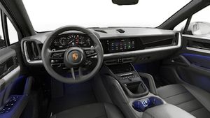 Vista interior, mostrando o volante e o painel de instrumentos de Cayenne S
