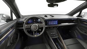 Vista interior, mostrando o volante e o painel de instrumentos de Macan Turbo