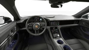 Vista interior, mostrando o volante e o painel de instrumentos de Taycan Sport Turismo Black Edition
