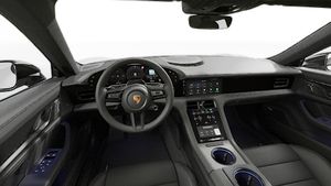 Vista interior que muestra el volante y el salpicadero de Taycan 4S Black Edition