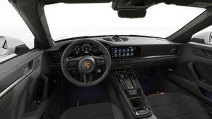 Interior view showing the steering wheel and dashboard of 911 Carrera GTS Cabriolet
