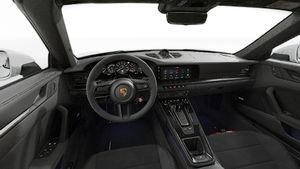 Interior view showing the steering wheel and dashboard of 911 Targa 4 GTS