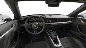 Interior view showing the steering wheel and dashboard of 911 Targa 4S